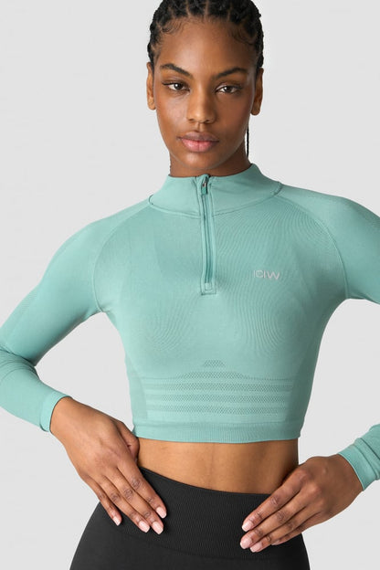 define seamless cropped 1/4 zip mineral green